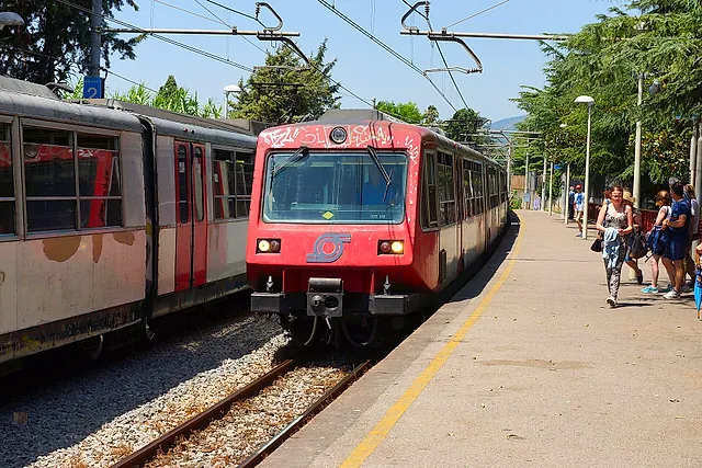 A Circumvesuviana train arriving at the Pompei Scavi – Villa dei Misteri station