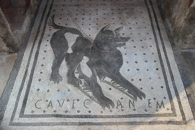 The "Cave canem" (beware of the dog) mosaic at the entrance of the House of the Tragic Poet in Pompeii