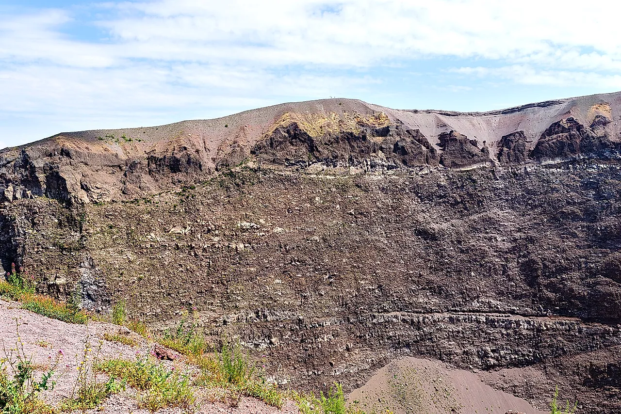 The layered inner wall of the Vesuvius crater with the rim above